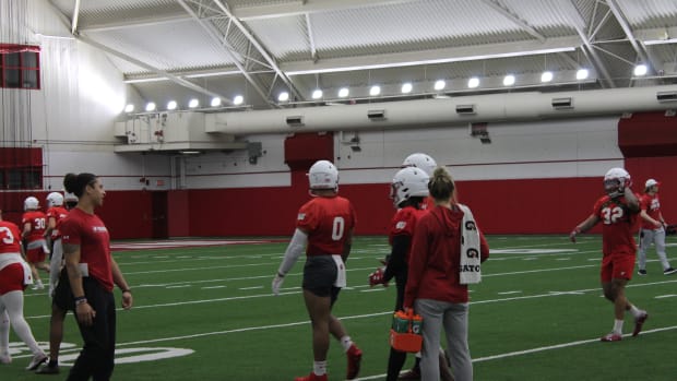 Starting running back Braelon Allen waits in line before running a route in practice.